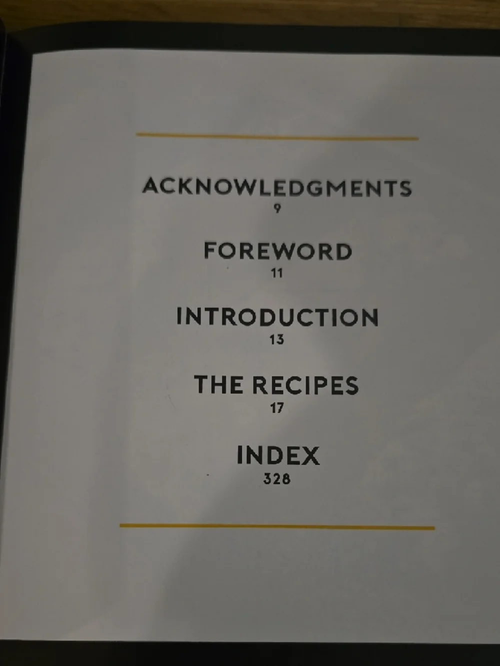 Source Unknown Binging with Babish Hardcover — Black and Orange